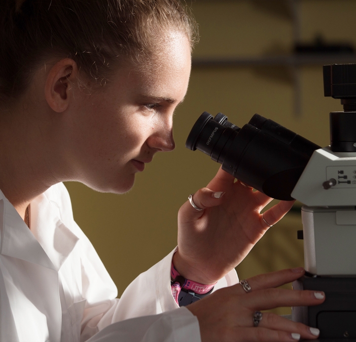 Student at a microscope