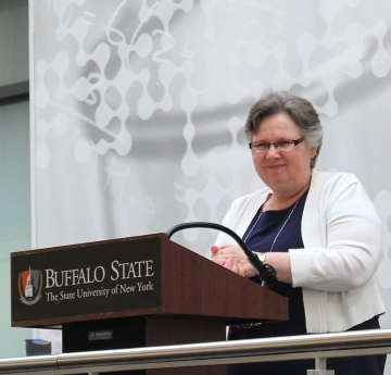 Faculty member at a podium